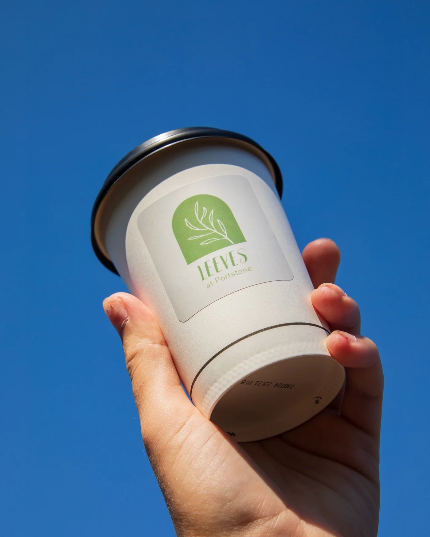 Leeves branded takeaway coffee cup